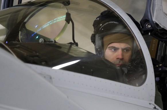 Italy&#039;s Eurofighter Typhoon jet fighter pilot prepares for take off during NATO&#039;s Baltic Air Policing Mission at the Siauliai airbase some 240 kms (150 miles) east of the capital Vilnius, Li ...