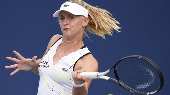 epa07798296 Jil Teichmann of Switzerland hits a return to Elise Mertens of Belgium during their match on the second day of the US Open Tennis Championships the USTA National Tennis Center in Flushing  ...