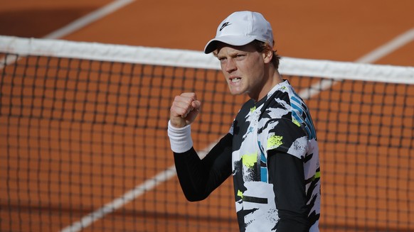 Italy&#039;s Jannik Sinner clenches his fist after scoring a point against Germany&#039;s Alexander Zverev in the fourth round match of the French Open tennis tournament at the Roland Garros stadium i ...