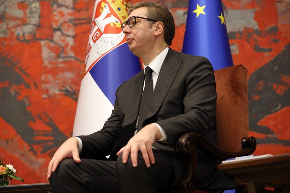 epa10321947 Serbian President Aleksandar Vucic and President of Azerbaijan Ilham Aliyev (not pictured) talk during their meeting in Belgrade, Serbia, 23 November 2022. President Aliyev is on an offici ...