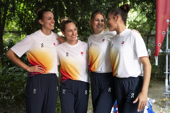 Swiss beach volleyball athletes Tanja Hueberli, Nina Brunner, Esmee Boebner and Zoe Verge-Depre, from left to right, pose at the Maison Suisse during a press conference, prior to the 2024 Paris Summer ...
