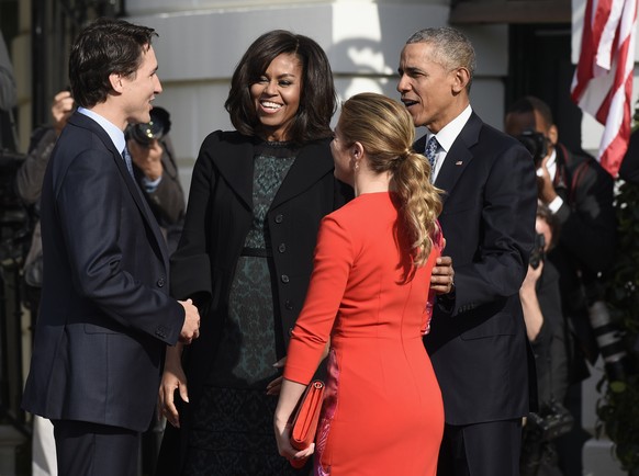 President Barack Obama and first lady Michelle Obama welcome Canadian Prime Minister Justin Trudeau and his wife Sophie Gregoire Turdeau to the White House in Washington, Thursday, March 10, 2016, dur ...