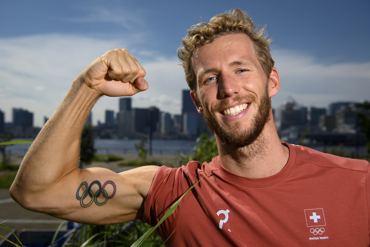 epa09355980 Swiss swimmer Jeremy Desplanches poses for photographers after a virtual press conference at the 2020 Summer Olympics, in Tokyo, Japan, 21 July 2021. EPA/LAURENT GILLIERON EDITORIAL USE ON ...