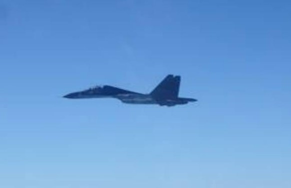 epa09502485 A handout photo made available by Taiwan Ministry of National Defense on 02 October 2021 shows a Chinese PLA Sukhoi SU-30 fighter, following the incursion of nineteen Chinese PLA warplanes ...