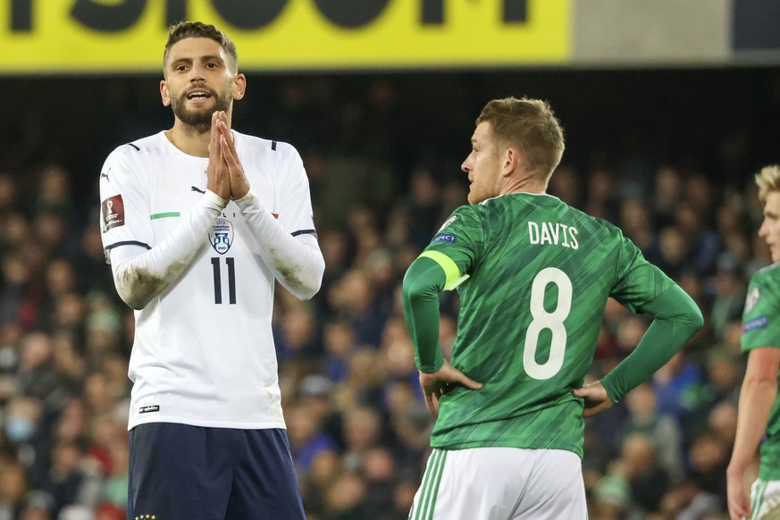 Domenico Berardi of Italy reacts after a missed shot at goal during the World Cup 2022 group C qualifying soccer match between Northern Ireland and Italy at Windsor Park stadium in Belfast, Northern I ...