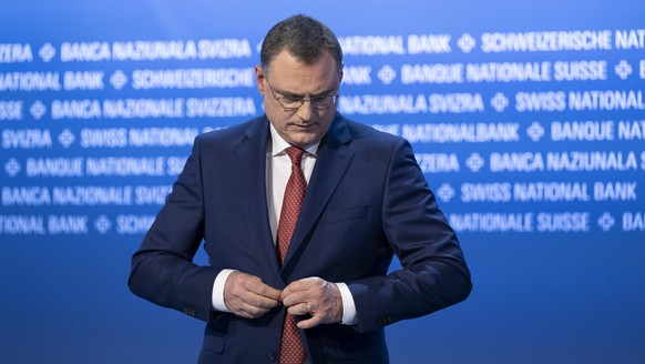 Swiss National Bank&#039;s (SNB) Chairman of the Governing Board Thomas Jordan ties his suit at the end of 115. Ordinary General Assembly of Swiss National Bank (SNB), at Bern, Switzerland, this Frida ...