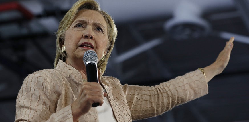 FILE - In this Aug. 17, 2016 file photo, Democratic presidential candidate Hillary Clinton speaks at campaign event at John Marshall High School in Cleveland. (AP Photo/Carolyn Kaster, File)