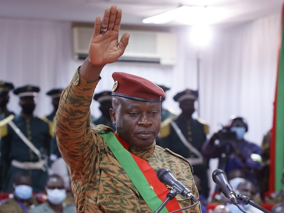 epa09763036 Lieutenant Colonel Paul-Henri Damiba is sworn in as head of state during a ceremony held in Ouagadougou, Burkina Faso, 16 February 2022. Lieutenant Colonel Paul-Henri Damiba is the leader  ...