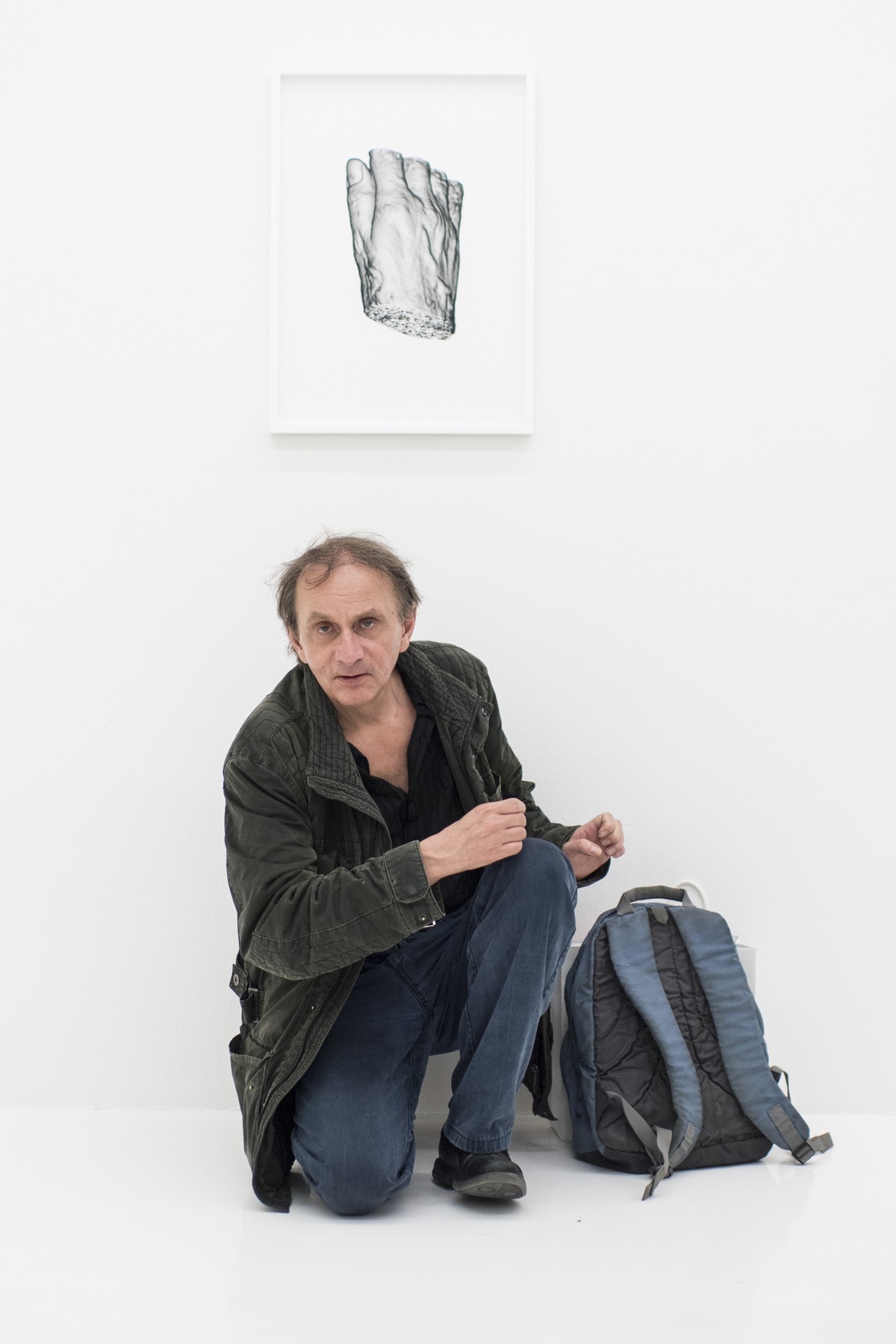 French Artist Michel Houellebecq watches his artwork "Matiere from the series Michel Houellebecq OK?", at the Helmhaus during the press and preview day of the european biennale of contempora ...