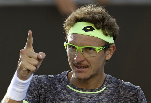 Uzbekistan&#039;s Denis Istomin celebrates after defeating Spain&#039;s Pablo Carreno Busta during their third round match at the Australian Open tennis championships in Melbourne, Australia, Saturday ...