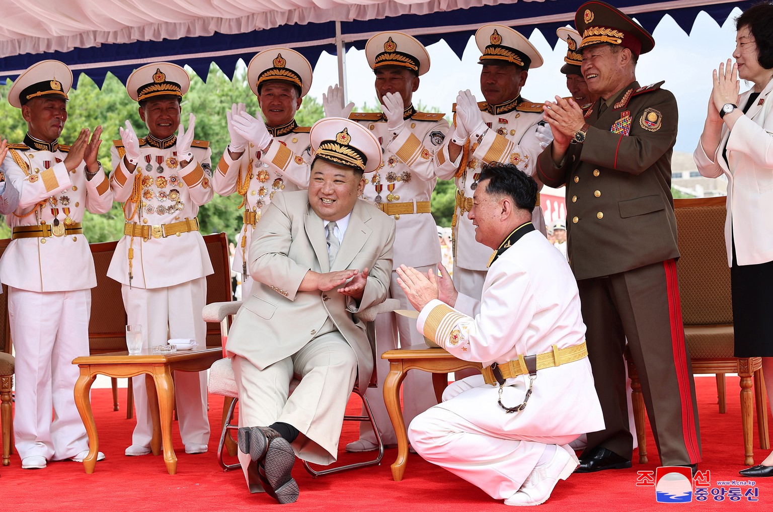 epa10847727 A photo released by the official North Korean Central News Agency (KCNA) shows North Korean leader Kim Jong Un (C) presiding over a launching ceremony for what is said to be a tactical nuc ...