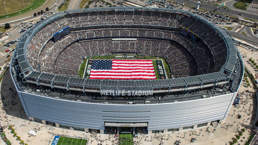 Sep 11, 2016; East Rutherford, NJ, USA; A aerial view of MetLife Stadium during the national anthem with a 100 yard American Flag before the start of the game between the Cincinnati Bengals and the Th ...