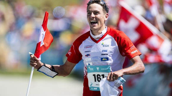 Winner Matthias Kyburz of Switzerland celebrates at the Orienteering World Championships middle distance race, on Saturday, July 15, 2023, in Flims/Laax, Switzerland. (KEYSTONE/Gian Ehrenzeller)