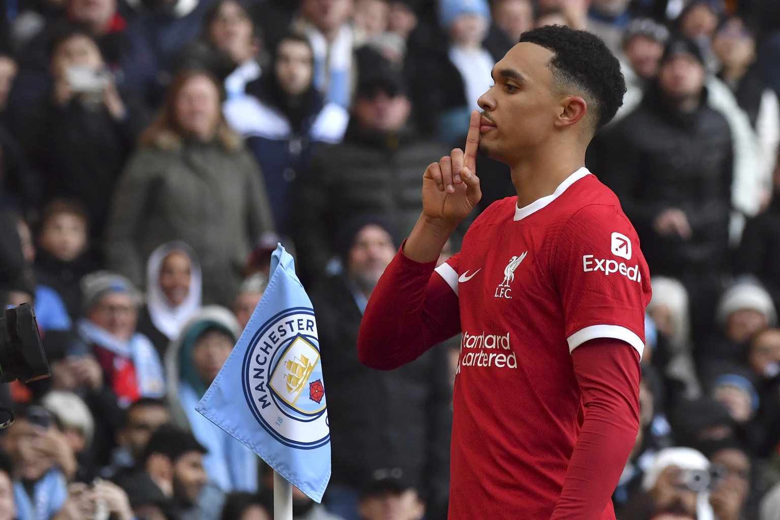 Liverpool&#039;s Trent Alexander-Arnold celebrates after scoring his side&#039;s opening goal during the English Premier League soccer match between Manchester City and Liverpool at Etihad stadium in  ...
