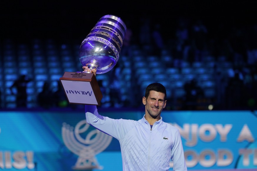 epa10220171 Serbia&#039;s Novak Djokovic poses with the trophy after winning against Marin Cilic of Croatia in the final match of the Tel Aviv Watergen open tournament, in Tel Aviv, Israel, 02 October ...