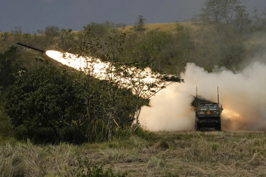 A U.S. M142 High Mobility Artillery Rocket System (HIMARS) fires a missile during a joint military drill between the Philippines and the U.S. called Salaknib at Laur, Nueva Ecija province, northern Ph ...