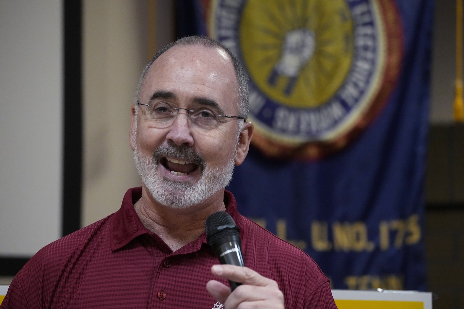United Auto Workers President Shawn Fain speaks to Volkswagen auto workers Friday, April 19, 2024, in Chattanooga, Tenn., after workers at a VW factory voted to join the UAW. (AP Photo/George Walker I ...