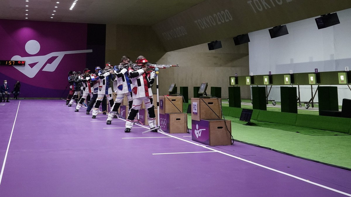 Athletes compete in the men's 10-meter air rifle at the Asaka Shooting Range in the 2020 Summer Olympics, Sunday, July 25, 2021, in Tokyo, Japan. (AP Photo/Alex Brandon)