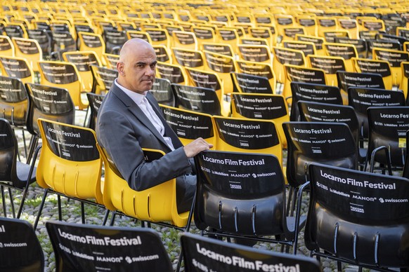 epa09397210 Swiss Federal Councillor Alain Berset poses at the Piazza Grande, the open-air venue of the 74th Locarno International Film Festival, in Locarno, Switzerland, 05 August 2021. The Festival  ...