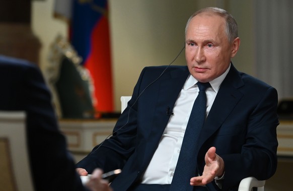 epa09271451 Russian President Vladimir Putin gestures speaking during an interview to NBC News at the Moscow Kremlin, Russia, 14 June 2021. A meeting between US President Biden and Russian President P ...