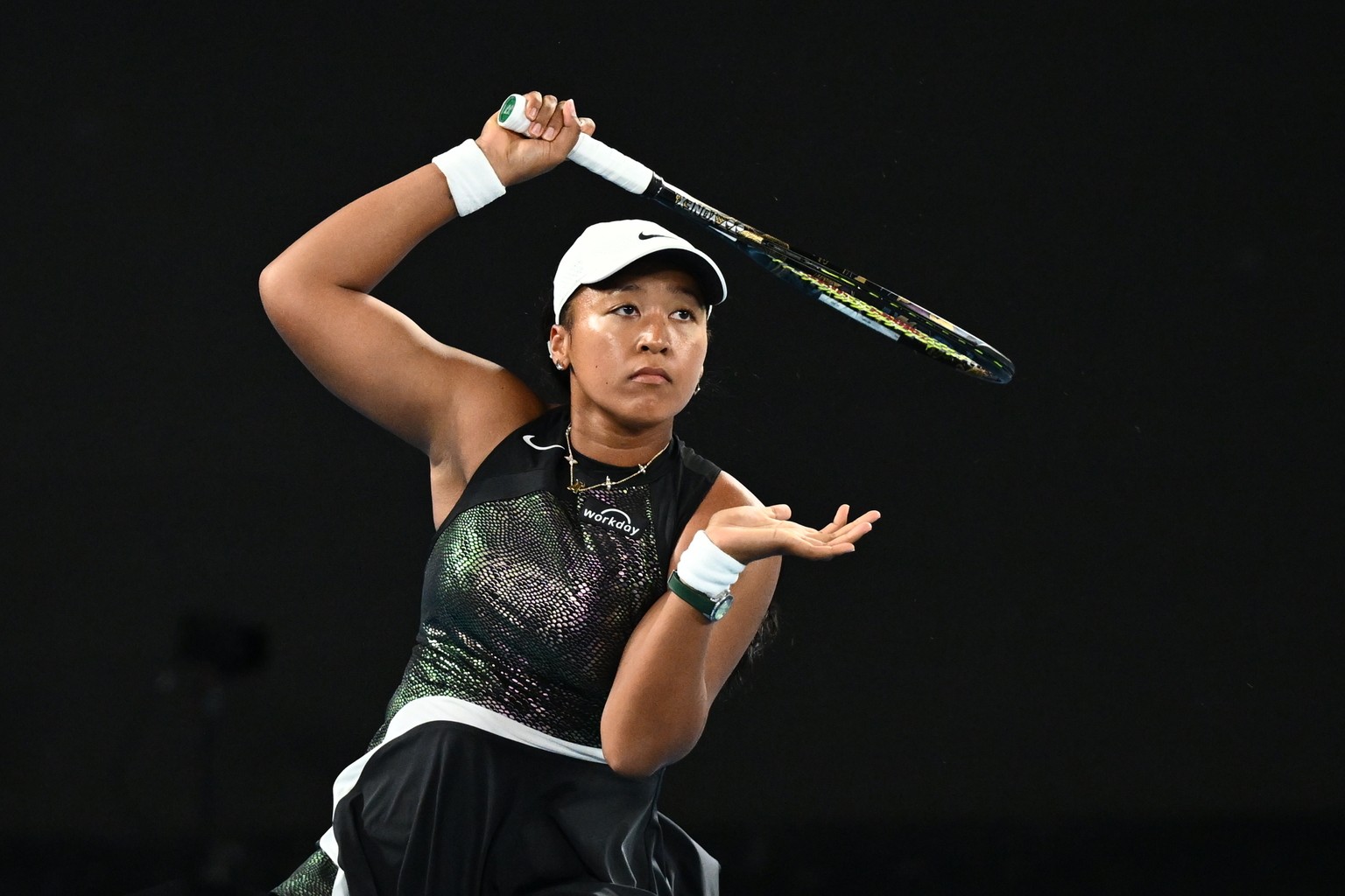 epa11079347 Naomi Osaka of Japan in action during her first round match against Caroline Garcia of France on Day 2 of the 2024 Australian Open at Melbourne Park in Melbourne, Australia, 15 January 202 ...