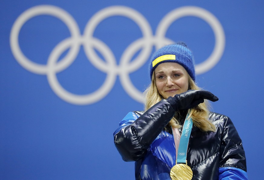 epa06524412 Gold medalist Stina Nilsson of Sweden during the medal ceremony for the women&#039;s Cross Country Sprint Classic event during the PyeongChang 2018 Olympic Games, South Korea, 14 February  ...