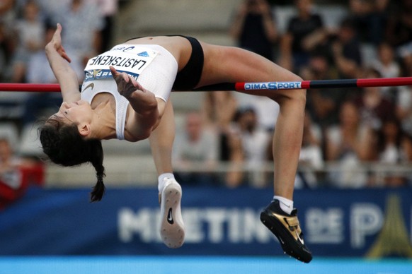 FILE - Russian athlete Maria Lasitskene competes in the women&#039;s high jump at the IAAF Diamond League athletics meeting at Charlety Stadium in Paris on June 30, 2018. Lasitskene is not allowed to  ...