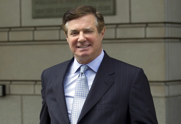 FILE - In this May 23, 2018, file photo, Paul Manafort, President Donald Trump&#039;s former campaign chairman, leaves the Federal District Court after a hearing, in Washington. A federal judge in Was ...