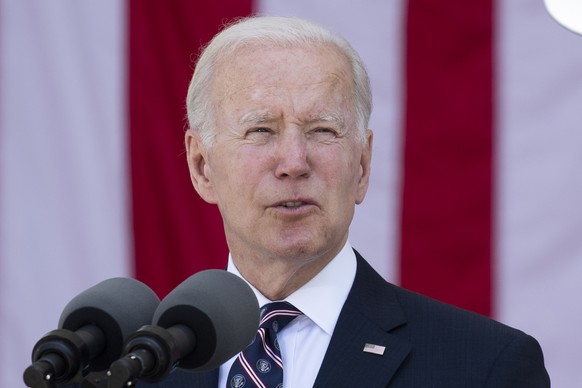 epa09986782 US President Joe Biden delivers an address at the 154th National Memorial Day Observance at Memorial Amphitheater at Arlington National Cemetery, in Arlington, Virginia, USA, 30 May 2022.  ...