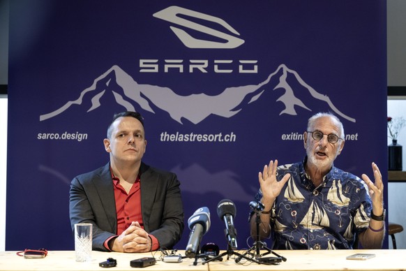 epa11483325 Australian doctor Philip Nitschke (R), founder of the euthanasia organization Exit International, speaks next to Florian Willet, co-president of the Last Resort organization, during a pres ...