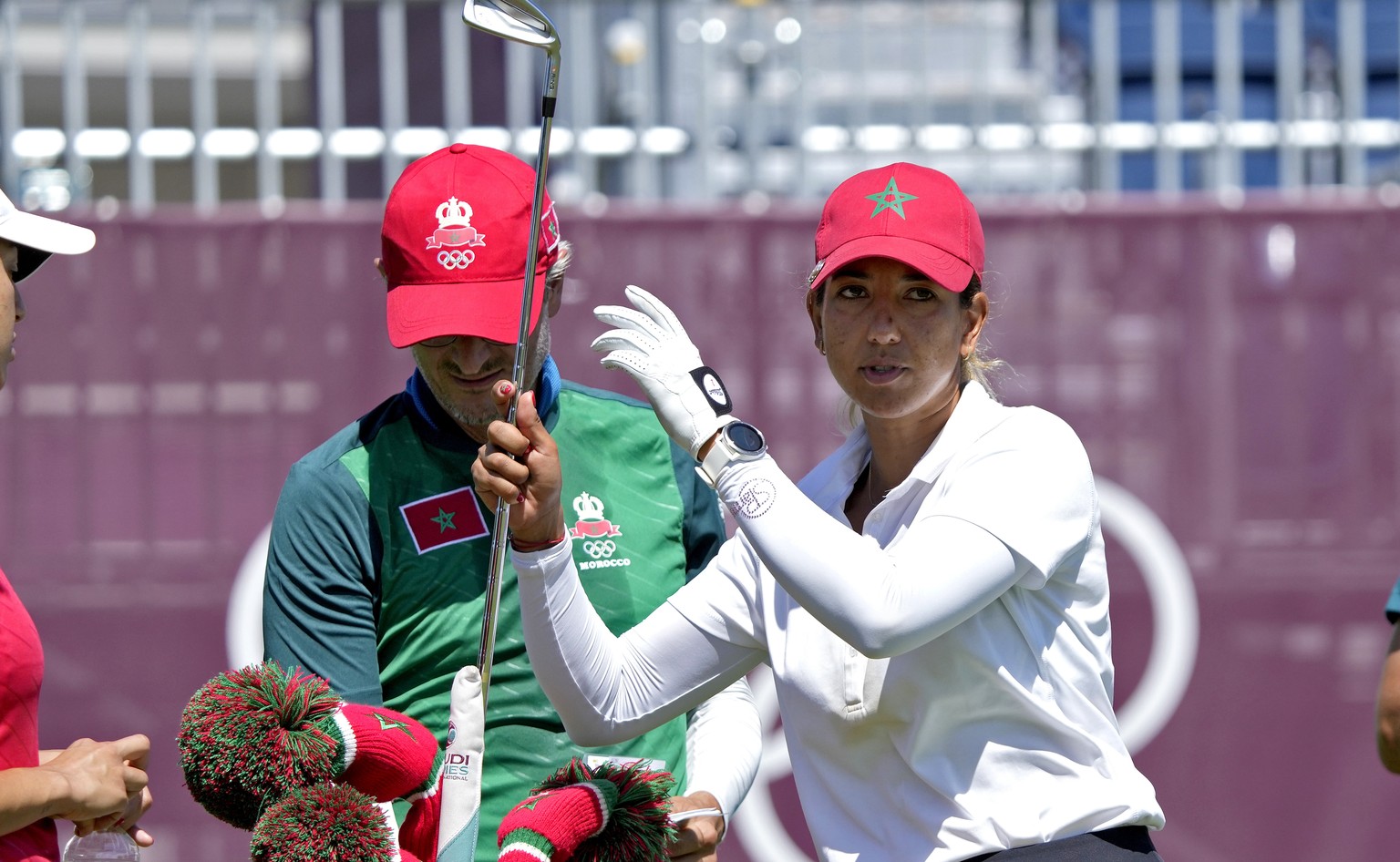 Maha Haddioui, of Morocco, prepares to hit from the first tee during a practice round prior to the women&#039;s golf event at the 2020 Summer Olympics, Tuesday, Aug. 3, 2021, at the Kasumigaseki Count ...