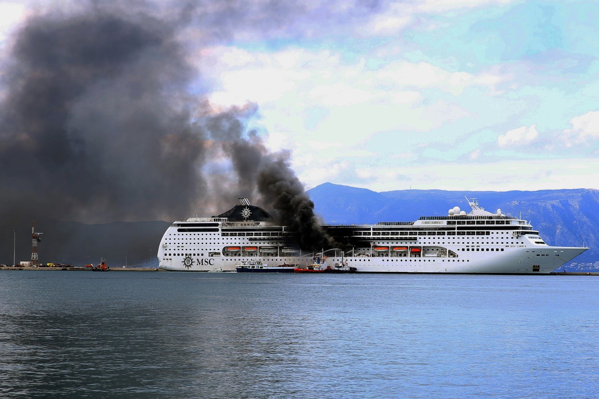 epa09069959 A fire broke out on the 'MSC Lirica' cruiseship on 12 March 2021, while it was tied at the Corfu port, Ionian Sea, Greece, since January 30 for the winter season. Onboard were cr ...