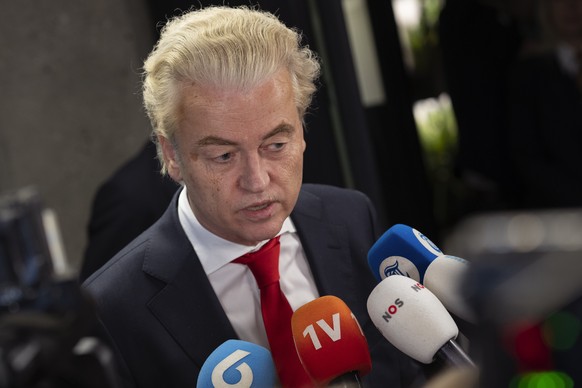 FILE - Geert Wilders, leader of the far-right party PVV, or Party for Freedom, talks to the media after a meeting with speaker of the House Vera Bergkamp, two days after Wilders won the most votes in  ...