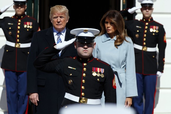 President Donald Trump and first lady Melania Trump wait for the arrival of Israeli Prime Minister Benjamin Netanyahu and his wife Sara Netanyahu to the White House, Monday, March 5, 2018, in Washingt ...