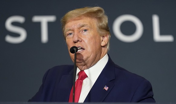 FILE - Former President Donald Trump speaks at an America First Policy Institute agenda summit at the Marriott Marquis in Washington, July 26, 2022. A newly released FBI document helps flesh out the c ...