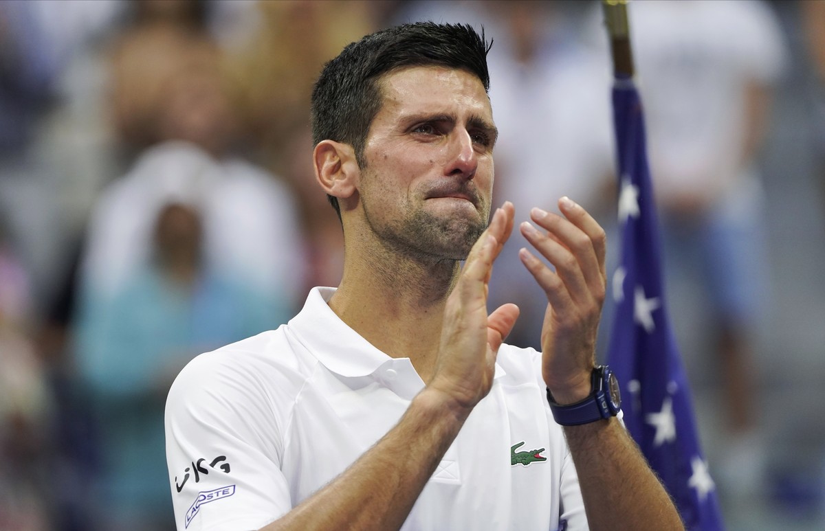 FILE - Novak Djokovic, of Serbia, reacts to the crowd after losing to Daniil Medvedev, of Russia, in the men's singles final of the US Open tennis championships Sept. 12, 2021, in New York. The m ...