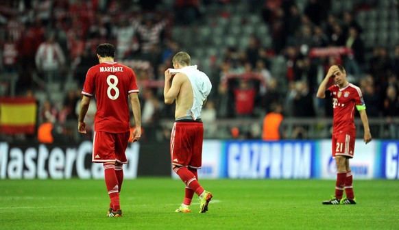 Die Bayern zotteln geschlagen vom Platz: In der Bundesliga unangefochten, in der Champions League an Real Madrid gescheitert.