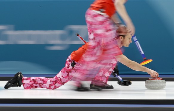 Norway&#039;s skip Thomas Ulsrud prepares to push the stone during their men&#039;s curling match against Japan at the 2018 Winter Olympics in Gangneung, South Korea, Wednesday, Feb. 14, 2018. (AP Pho ...