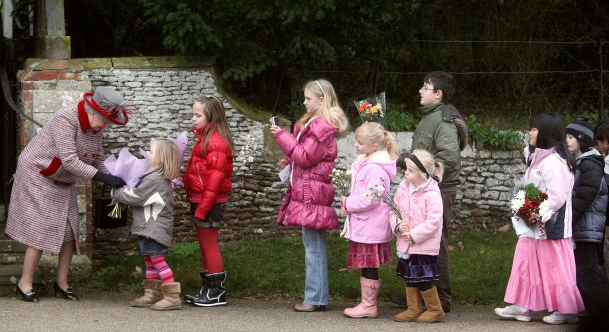 WINDSOR, ENGLAND - DECEMBER 08: Queen Elizabeth II thanks volunteers and key workers at Windsor Castle on December 08, 2020 in Windsor, England. The Queen and members of the royal family gave thanks t ...