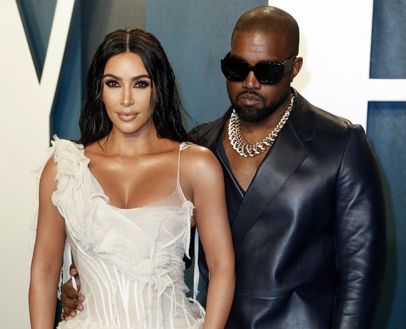 epa08528691 (FILE) - Kim Kardashian and husband, US rapper Kanye West (R), attend the 2020 Vanity Fair Oscar Party following the 92nd annual Academy Awards ceremony, in Beverly Hills, California, USA, 09 February 2020 (reissued 05 July 2020). Kanye West announced on twitter that he was 'running for president of the United States'. The US will hold presidential elections on November 3, 2020. EPA/RINGO CHIU *** Local Caption *** 55864945