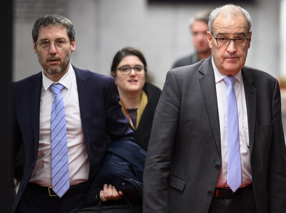 Switzerland&#039;s Economy Minister Federal Councillor Guy Parmelin arrives with Urs Wiedmer, left, Chief of Media WBF for a press conference at the House of Switzerland, HoS, on the sideline of the 5 ...