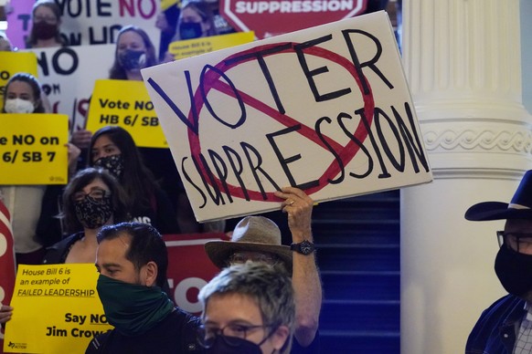 FILE - In this May 6, 2021 file photo, a group opposing new voter legislation gather outside the House Chamber at the Texas Capitol in Austin, Texas. Texas Republicans dug in Saturday, May 29 for a fi ...