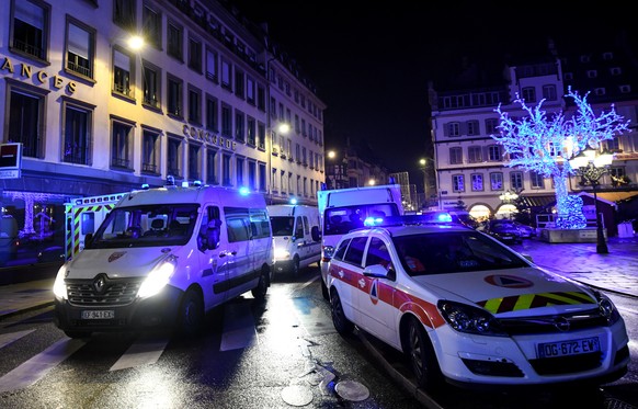 epa07224977 Rescue vehicles are parked near the Christmas market where a deadly shooting took place in Strasbourg, France, 12 December 2018. According to media reports, four people have been killed an ...