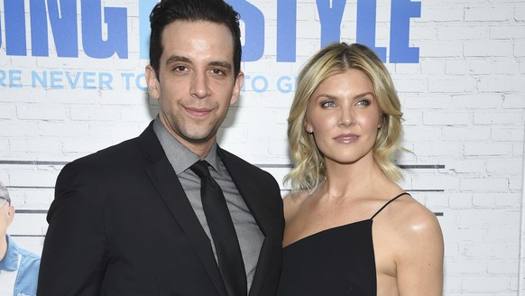 FILE - In this March 30, 2017, file photo, actor Nick Cordero, left, and Amanda Kloots attend the premiere of &quot;Going in Style&quot; in New York. Tony Award-nominated actor Cordero, who specialize ...