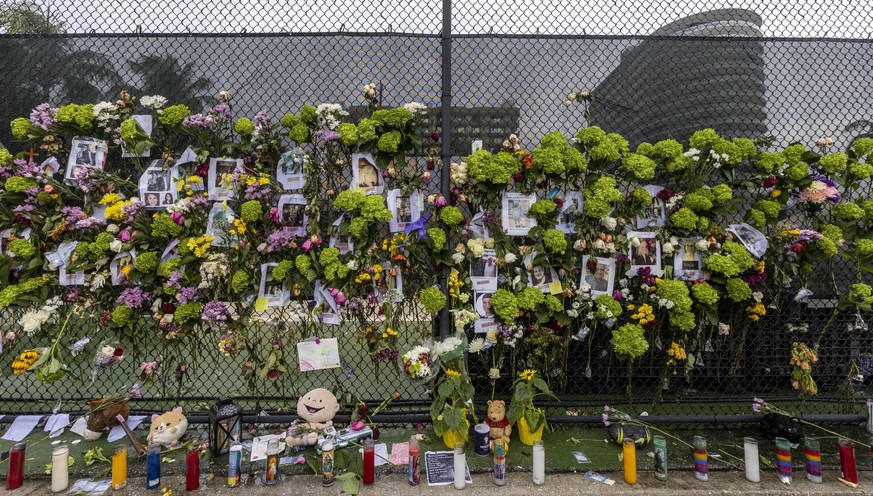 A makeshift memorial is set up near the site of the collapsed condominium in Surfside, Fla., Monday, June 28, 2021. (Jose A Iglesias/Miami Herald via AP)