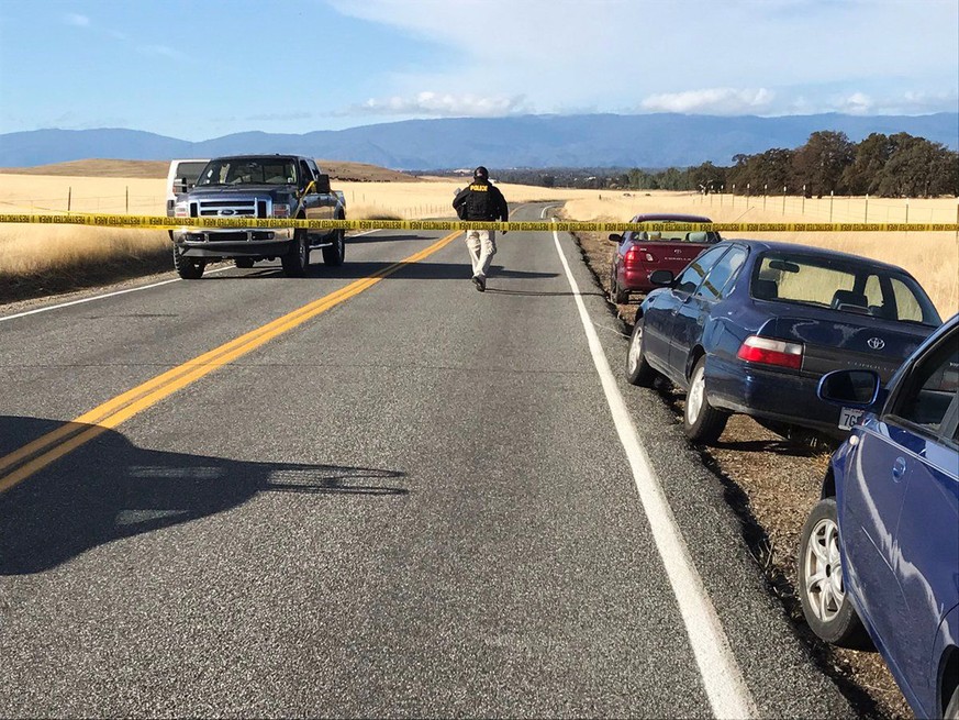 Crime tape blocks off Rancho Tehama Road leading into the Rancho Tehama subdivision south of Red Bluff, Calif., following a fatal shooting on Tuesday, Nov. 14, 2017. (Jim Schultz/The Record Searchligh ...