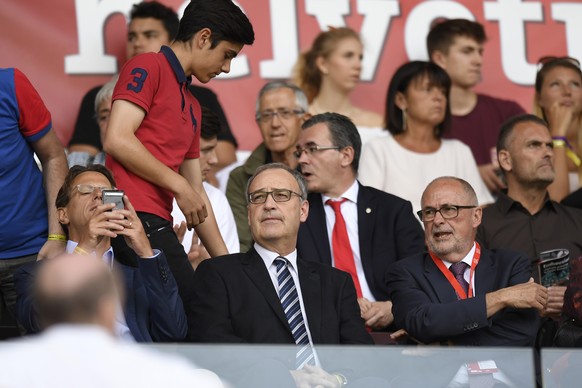 National councillor Christian Luescher, Federal councillor Guy Parmelin and Peter Gillieron, president of the Swiss Football Federation SFV, from left, are ready to watch the Swiss Cup final soccer ma ...