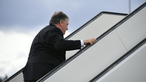 US Secretary of State Mike Pompeo boards a plane at Rovaniemi Airport in Rovaniemi, Finland, after taking part in the 11th Ministerial Meeting of the Arctic Council, Tuesday May 7, 2019. (Mandel Ngan/ ...