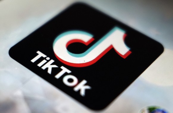 FILE - In this Sept. 28, 2020 file photo, a view of the TikTok app logo, in Tokyo. Senior managers at tech companies face up to two years in prison if they fail to comply with new British laws aimed a ...