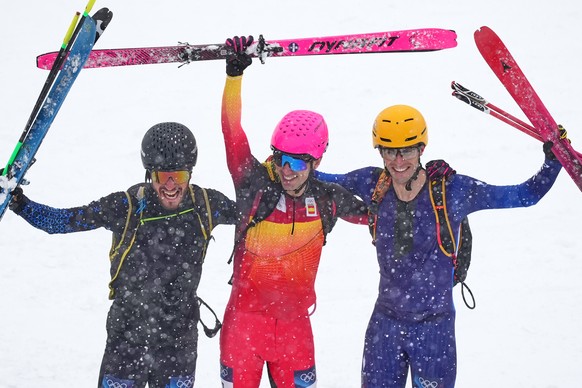 Gold medal's winner Spain's Oriol Cardona Coll, center, silver medal's winner Individual Neutral Athlete Nikita Filippov, left, and bronze medal's winner France's Thibault Ans ...